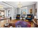 Elegant living room with hardwood floors, fireplace, and large windows at 750 N Clarkson St, Denver, CO 80218