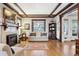 Cozy living room with hardwood floors, fireplace, and a comfortable sitting area at 750 N Clarkson St, Denver, CO 80218