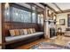 Charming living room featuring built-in window seat and hardwood floors at 750 N Clarkson St, Denver, CO 80218