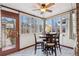 Bright sunroom with a table and chairs, providing additional living space at 750 N Clarkson St, Denver, CO 80218