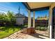 Relaxing covered patio with serene garden views, perfect for outdoor entertaining and leisure at 1836 S Grant St, Denver, CO 80210