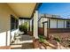 Inviting covered patio with a charming seating area, perfect for enjoying the outdoors at 1836 S Grant St, Denver, CO 80210