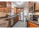 Well-equipped kitchen features stainless steel appliances and granite countertops, perfect for culinary enthusiasts at 1836 S Grant St, Denver, CO 80210