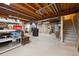 Basement area features a cement floor, stairs, and exposed ducts at 13225 Grove Way, Broomfield, CO 80020