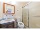 Standard bathroom featuring a vanity, mirror, toilet, and shower at 13225 Grove Way, Broomfield, CO 80020