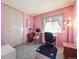 Colorful room featuring carpet, a window, furniture, and a closet at 13225 Grove Way, Broomfield, CO 80020