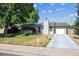 Charming single-story home with a well-maintained lawn and a cozy, inviting facade under a sunny sky at 13225 Grove Way, Broomfield, CO 80020