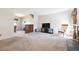 Neutral living room featuring soft carpet, natural light, and a relaxed atmosphere at 13225 Grove Way, Broomfield, CO 80020