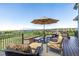 A large outdoor deck offers ample seating, a fireplace, and great views at 11857 S Saunter Ln, Parker, CO 80138