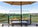 Relax on the deck by the fireplace with panoramic views of the surrounding landscape at 11857 S Saunter Ln, Parker, CO 80138