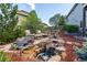 A tranquil backyard retreat with a beautiful water feature and cozy seating area at 11857 S Saunter Ln, Parker, CO 80138