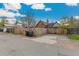 A spacious fenced parking area sits in the backyard, enhancing the utility of this charming property at 1748 S Logan St, Denver, CO 80210
