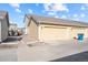 Two car garages with siding and concrete driveway at 15612 E 96Th Way # 20H, Commerce City, CO 80022