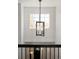 Entryway with high ceilings, modern lighting, and a view to the front door and staircase at 25362 E Indore Dr, Aurora, CO 80016