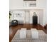 Cozy living room with hardwood floors, modern furnishings, and stylish decor at 25362 E Indore Dr, Aurora, CO 80016