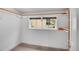Walk-in closet with neutral carpet and window at 113 E Saint Clair Ave, Longmont, CO 80504