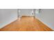 Bright living room with hardwood floors, white walls, and a view into other rooms at 113 E Saint Clair Ave, Longmont, CO 80504