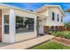 Charming home with a well-maintained lawn and inviting front entrance at 8475 W 74Th Dr, Arvada, CO 80005