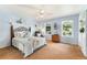 Bright bedroom with a ceiling fan, and natural light at 8475 W 74Th Dr, Arvada, CO 80005