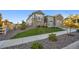 Two-story house with a well-manicured lawn and a walkway at 7870 Slate River St, Littleton, CO 80125