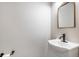 A newly renovated bathroom features an updated vanity and modern fixtures at 9272 E Mansfield Ave, Denver, CO 80237