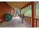 Outdoor patio featuring a grill and seating area perfect for dining and enjoying the scenic surroundings at 27612 Shadow Mountain Dr, Conifer, CO 80433