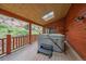 Outdoor patio with a hot tub and a scenic view perfect for relaxation and enjoying the natural surroundings at 27612 Shadow Mountain Dr, Conifer, CO 80433