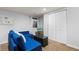 Basement living area with a comfortable couch and view of a TV at 12142 Bannock Cir # B, Denver, CO 80234