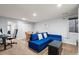 Open basement with a living area, work space, and recessed lighting at 12142 Bannock Cir # B, Denver, CO 80234