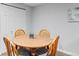 Basement dining area with space for four and neutral decor at 12142 Bannock Cir # B, Denver, CO 80234