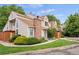 Inviting townhome featuring a well-manicured lawn and brick accents at 12142 Bannock Cir # B, Denver, CO 80234