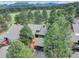 Stunning mountain home with lush trees, adjacent to the golf course, boasting picturesque views of the mountains at 2434 Hearth Dr # C1, Evergreen, CO 80439