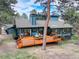 Beautiful backyard featuring a spacious deck perfect for outdoor gatherings and dining at 2434 Hearth Dr # C1, Evergreen, CO 80439