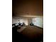 Finished basement features a projector screen and a sectional sofa at 2434 Hearth Dr # C1, Evergreen, CO 80439