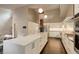 Spacious kitchen with an island, stainless steel appliances, and open layout, ideal for cooking and socializing at 2434 Hearth Dr # C1, Evergreen, CO 80439