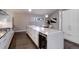 Contemporary kitchen with a large island, wine cooler, and ample storage, perfect for entertaining at 2434 Hearth Dr # C1, Evergreen, CO 80439