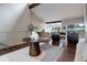 Bright living room with hardwood floors, modern decor, and natural light at 2434 Hearth Dr # C1, Evergreen, CO 80439