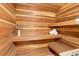 Inviting sauna with wooden benches and walls providing a serene, spa-like experience at 2434 Hearth Dr # C1, Evergreen, CO 80439