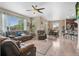Bright and airy living room with comfortable seating and an open layout at 5161 Chicory Cir, Brighton, CO 80601