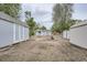 Expansive backyard with a cottage, sheds, and potential for a variety of outdoor activities at 233 N 10Th Ave, Brighton, CO 80601