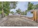 Wide backyard including a cottage, multiple sheds, and garden with room to roam at 233 N 10Th Ave, Brighton, CO 80601