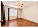 Well-lit bedroom with hardwood floors, natural light and a neutral color palette at 4894 E Ashton Ave, Castle Rock, CO 80104