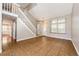 Open living room featuring tile floors, staircase and natural light at 4894 E Ashton Ave, Castle Rock, CO 80104