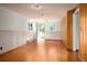 Finished basement with hardwood floors, wainscotting, windows and exterior access at 588 Newark St, Aurora, CO 80010