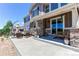 Outdoor patio with comfortable seating and a swing, perfect for enjoying the fresh air at 25338 E Costilla Pl, Aurora, CO 80016
