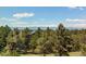 Scenic view of mountains and trees from the property, offering a tranquil setting at 25338 E Costilla Pl, Aurora, CO 80016