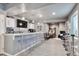 Finished basement bar with seating for four, bar top, and basement entertainment area at 10639 Worchester Dr, Commerce City, CO 80022
