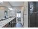 Modern bathroom with a double vanity, sleek fixtures, and a tiled shower, providing a spa-like experience at 10639 Worchester Dr, Commerce City, CO 80022