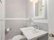Bathroom featuring a vanity sink and medicine cabinet at 618 Milwaukee St, Denver, CO 80206