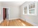 Bedroom with hardwood floors and a closet at 618 Milwaukee St, Denver, CO 80206